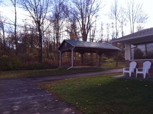 An outdoor pavillion near the woods at Crystal Springs Inn & Suites Towanda, PA